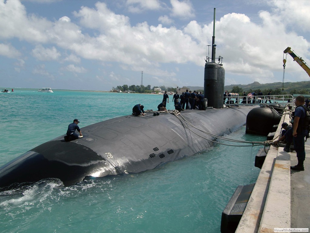 USS Cheyenne (SSN-773) tied up to the dock in the beautiful turquoise waters of Saipan, March 2005.